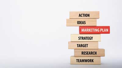 Marketing plan concept of stacked wooden blocks